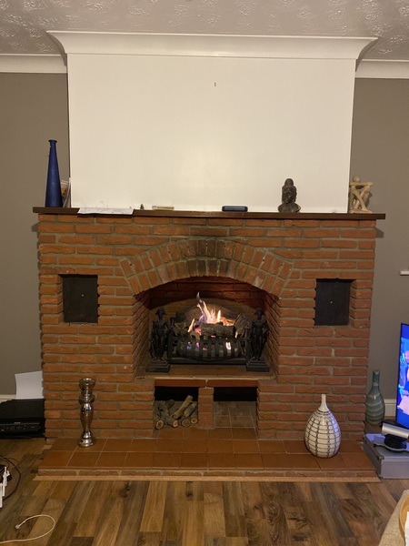 Red brick fireplace 😩