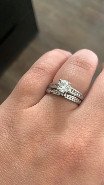 To show me your engagement rings?