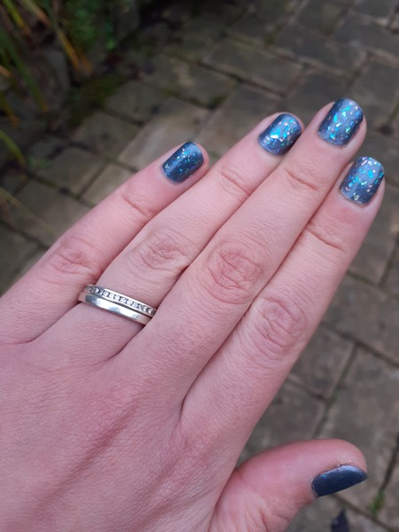 To show me your engagement rings?