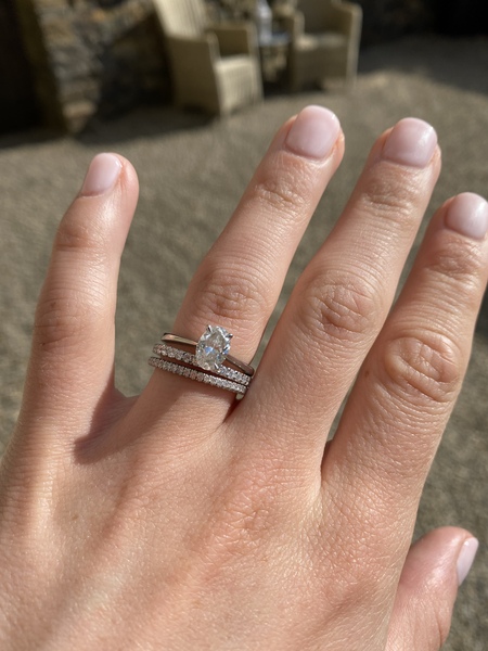 To show me your engagement rings?
