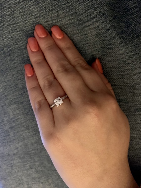 To show me your engagement rings?