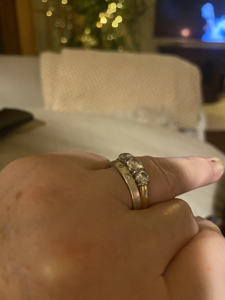 To show me your engagement rings?