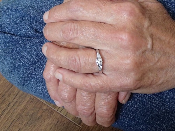 To show me your engagement rings?