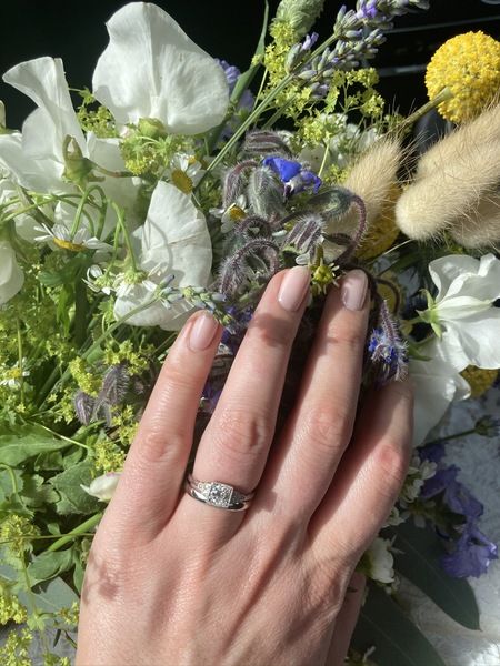 To show me your engagement rings?