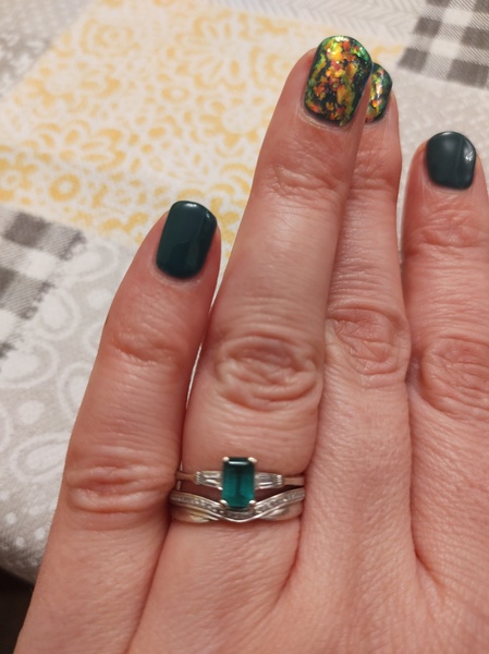 To show me your engagement rings?