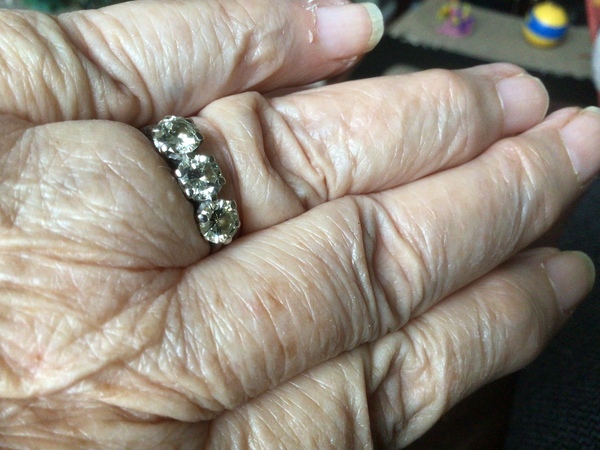 To show me your engagement rings?