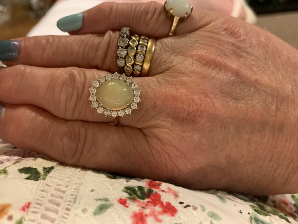 To show me your engagement rings?