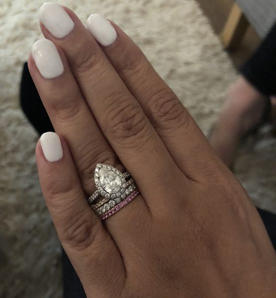 To show me your engagement rings?