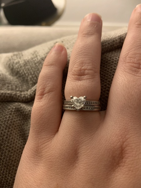 To show me your engagement rings?