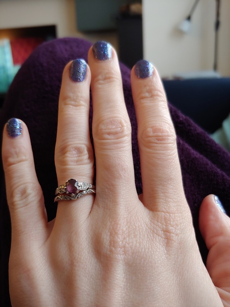 To show me your engagement rings?