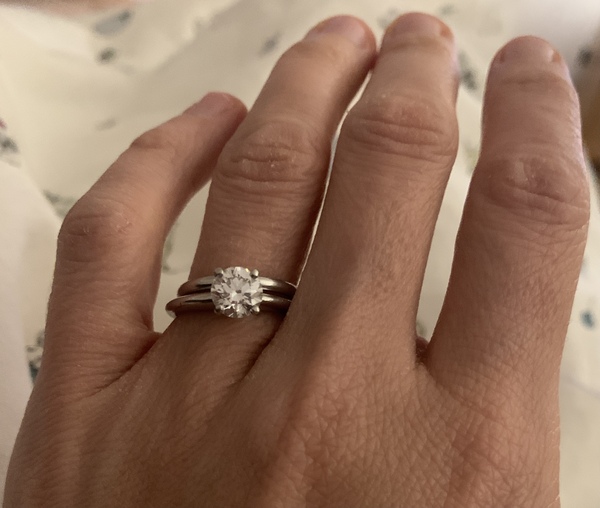 To show me your engagement rings?