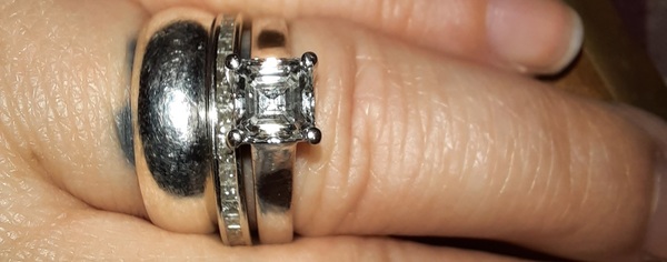 To show me your engagement rings?