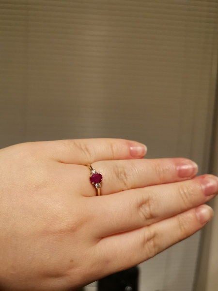 To show me your engagement rings?