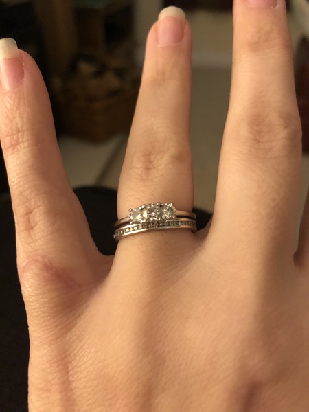 To show me your engagement rings?