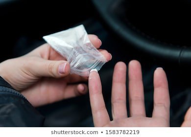 To ask why a man may have a single long fingernail?