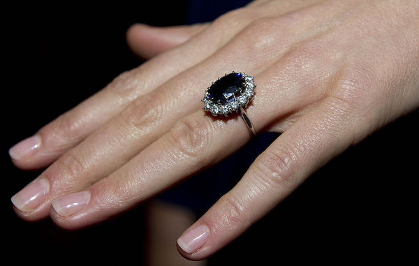 To show me your engagement rings?