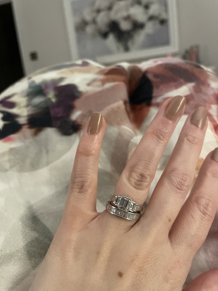 To show me your engagement rings?