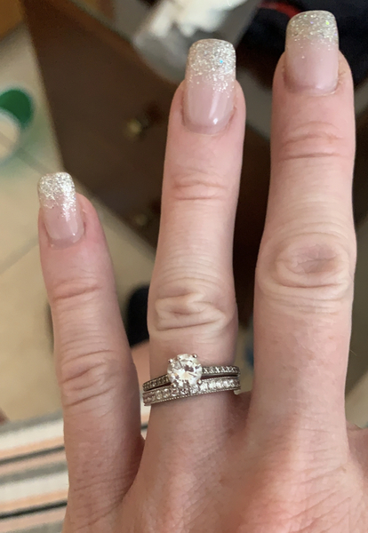 To show me your engagement rings?