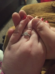To show me your engagement rings?