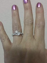 To show me your engagement rings?