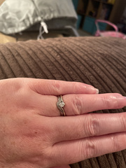 To show me your engagement rings?