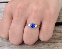To show me your engagement rings?
