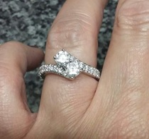 To show me your engagement rings?