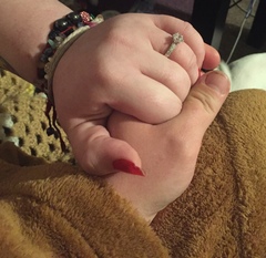 To show me your engagement rings?