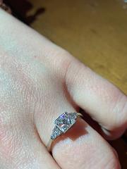 To show me your engagement rings?