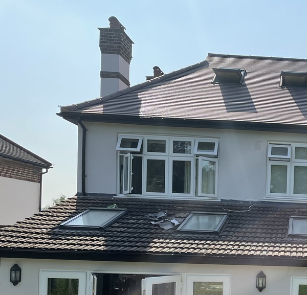 Choosing new roof tiles.