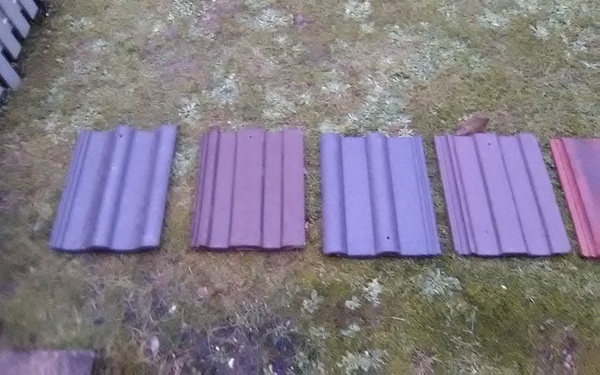 Choosing new roof tiles.