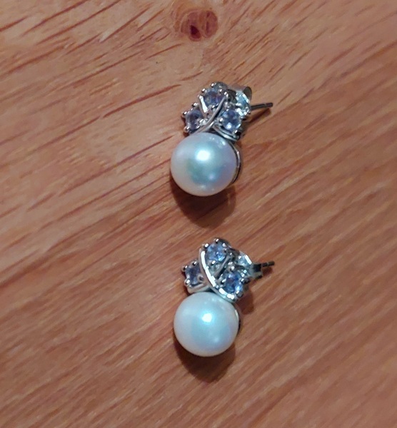 Please may I see your beautiful Pearl earrings.