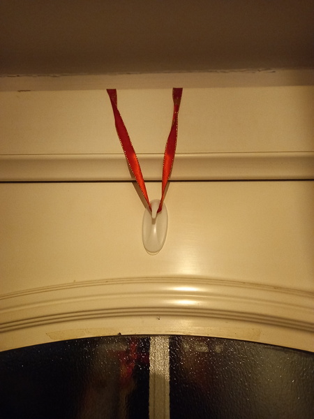 How can I hang my wreath?