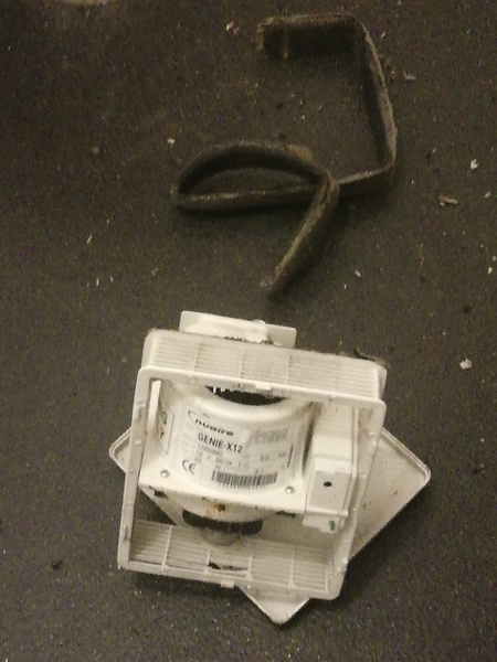 The extractor fan has just fallen off the ceiling