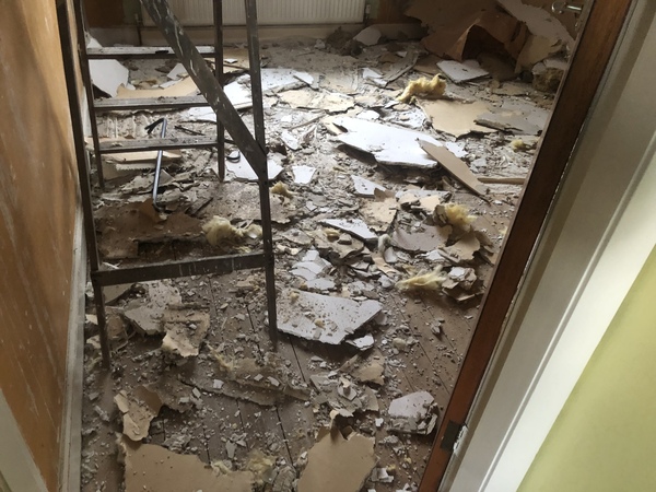 How do I ever get rid of this dust after knocking a ceiling down?