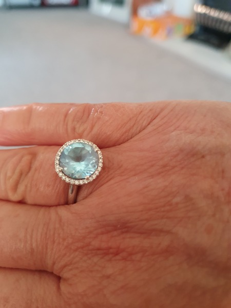 Show me your aquamarine ring please.