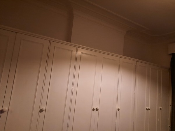 Space above fitted wardrobes