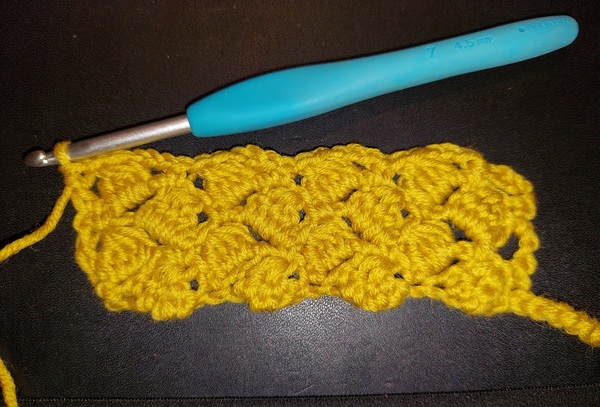 Can anyone decode this crochet stitch pattern?