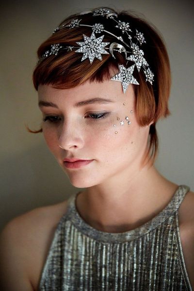 What colours and flowers to wear with silver wedding dress in May?