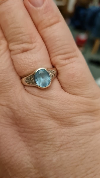 Show me your aquamarine ring please.