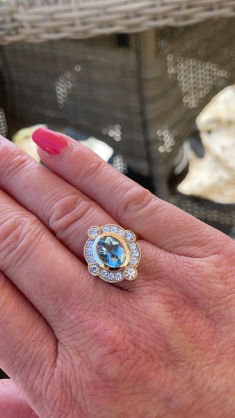Show me your aquamarine ring please.