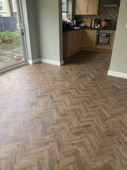 Has anyone covered over tiles with LVT?