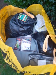 Help, tell me to start de-cluttering.  I have black bags, I have a cloth skip