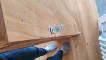 Help! How do I hang this heavy coat rack safely?