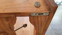 Help! How do I hang this heavy coat rack safely?