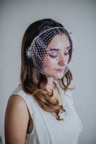What colours and flowers to wear with silver wedding dress in May?
