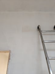 Brown marks on new plaster paint