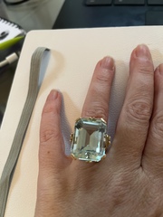 Show me your aquamarine ring please.
