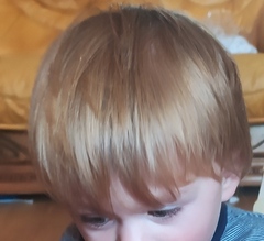 newborn hair turning orange?
