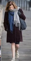 Why is Sue Grey wearing two scarves? Is this a thing now?